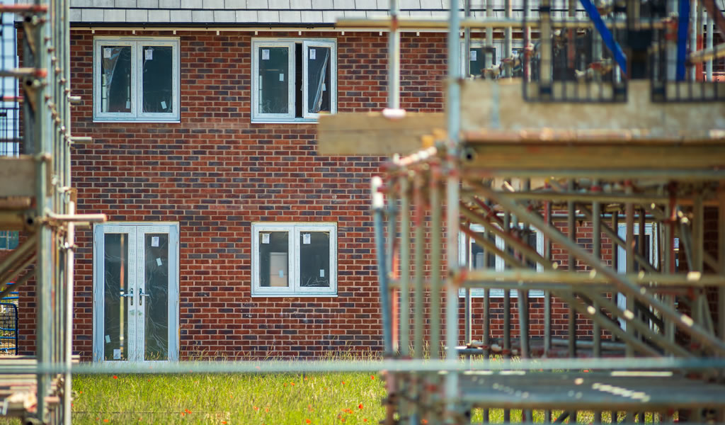 View through scaffolding at new housing